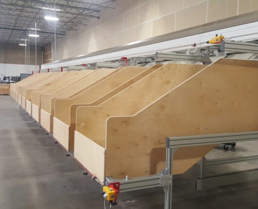 image of wooden chutes of a sweeper sorter